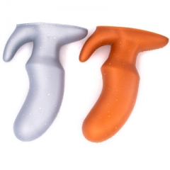 Oversized soft anal plug in the rear court