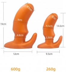 Oversized soft anal plug in the rear court
