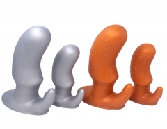 Oversized soft anal plug in the rear court