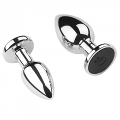 Metal vibrating anal plug magnetic suction charging rear chamber