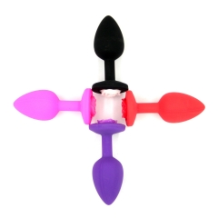 Small silicone with gold pink rose back anal plug