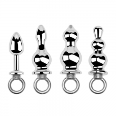Anal stopper with metal pulling ring and holding ring